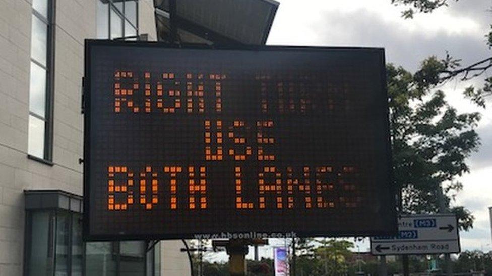 Traffic directions near Queen's Road in Belfast