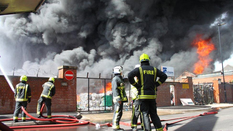 A large fire with smoke