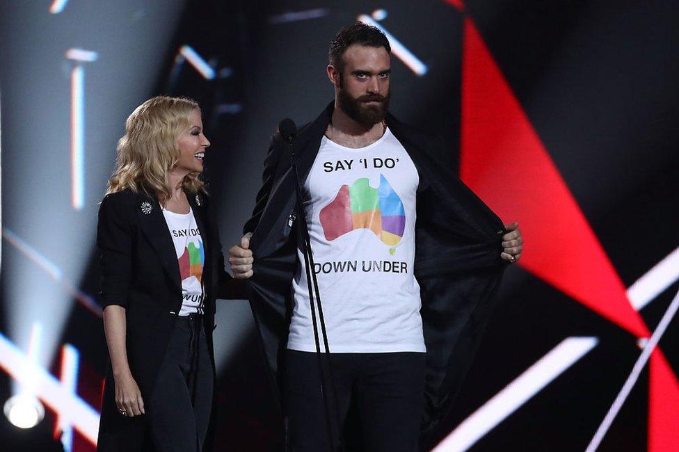 Australian singer Kylie Minogue and English actor Joshua Sasse at the ARIA Awards 2016