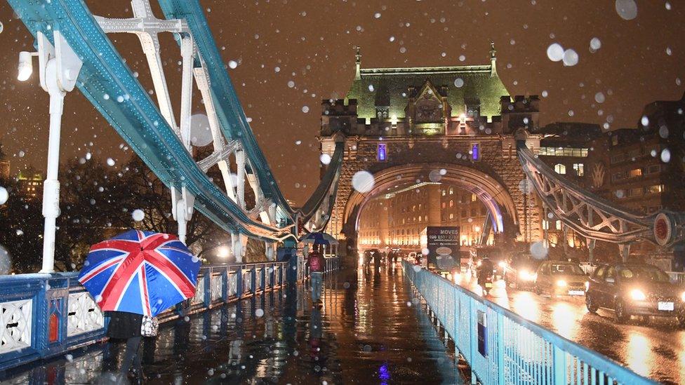 Snow falling at Tower Bridge in London