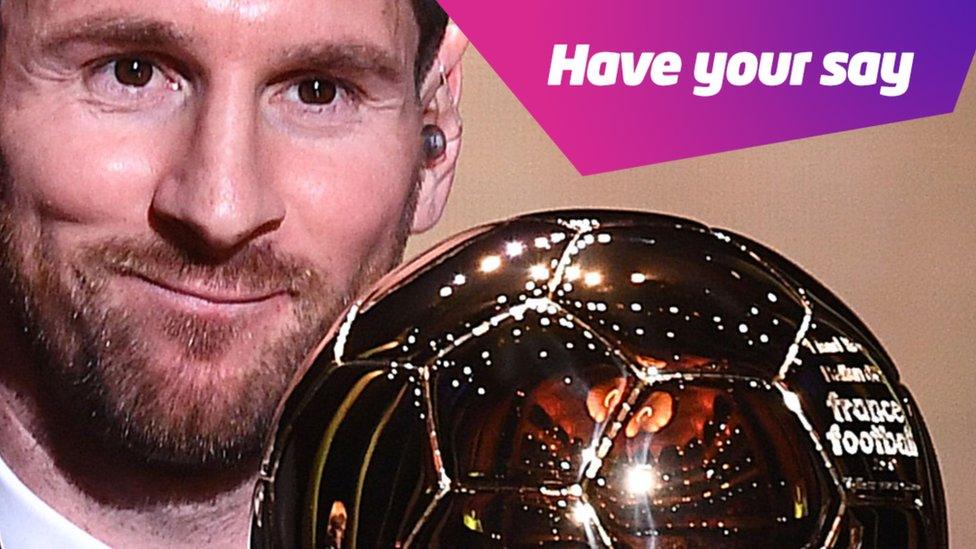 Messi with Ballon d'Or trophy.