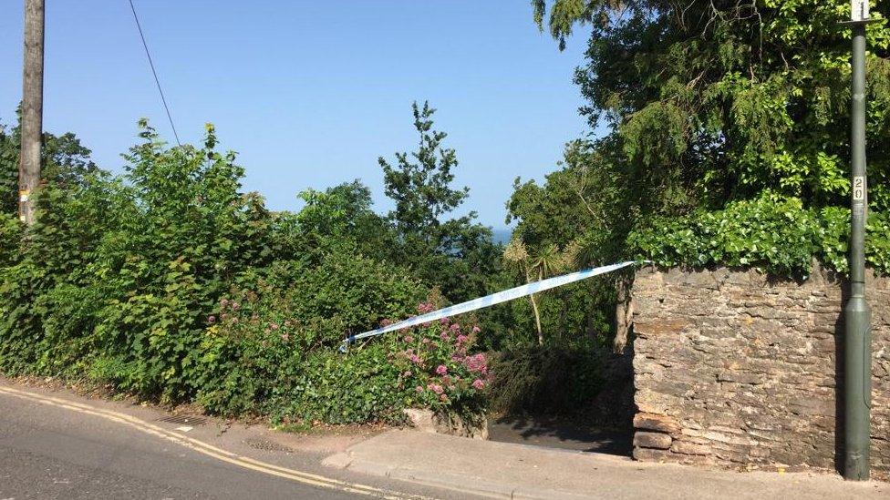 police tape over footpath