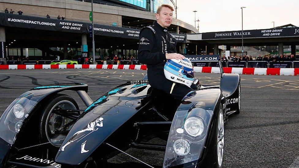 Mika Hakkinen, the Johnnie Walker global responsible drinking ambassador sitting on the Caparo T1 outside Wembley stadium on 4 Dec 2015