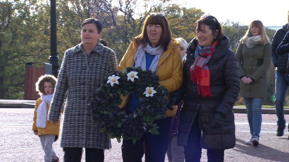 Families of the Disappeared lay a wreath at Stormont