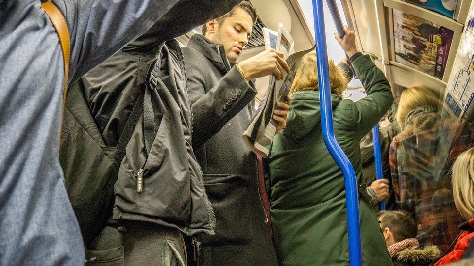 Busy train carriage