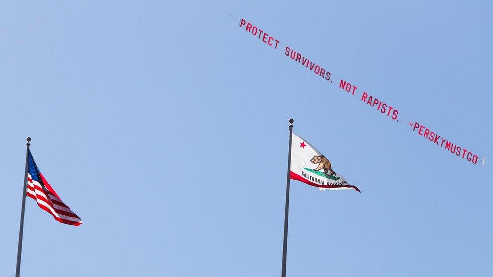 A plane flies over Stanford University with a banner reading 'Protect Survivors. Not Rapists. #PerskyMustGo'