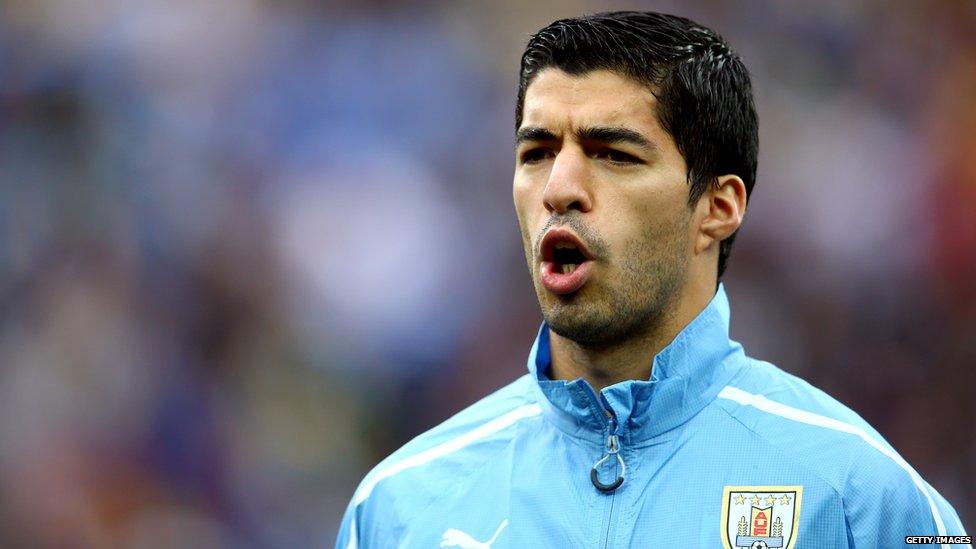 Luis Suarez sings the Uruguayan national anthem during the 2014 World Cup