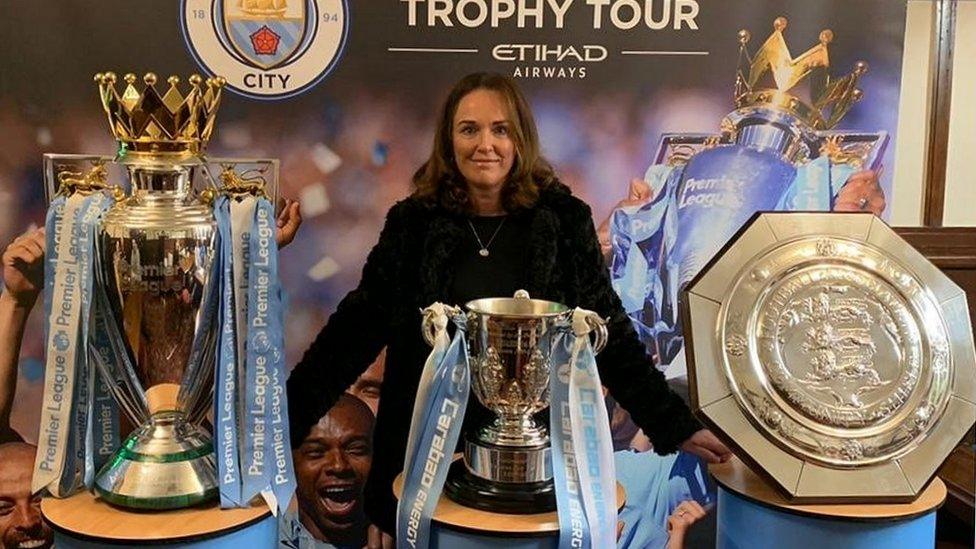 Rachel Herdson with City trophies