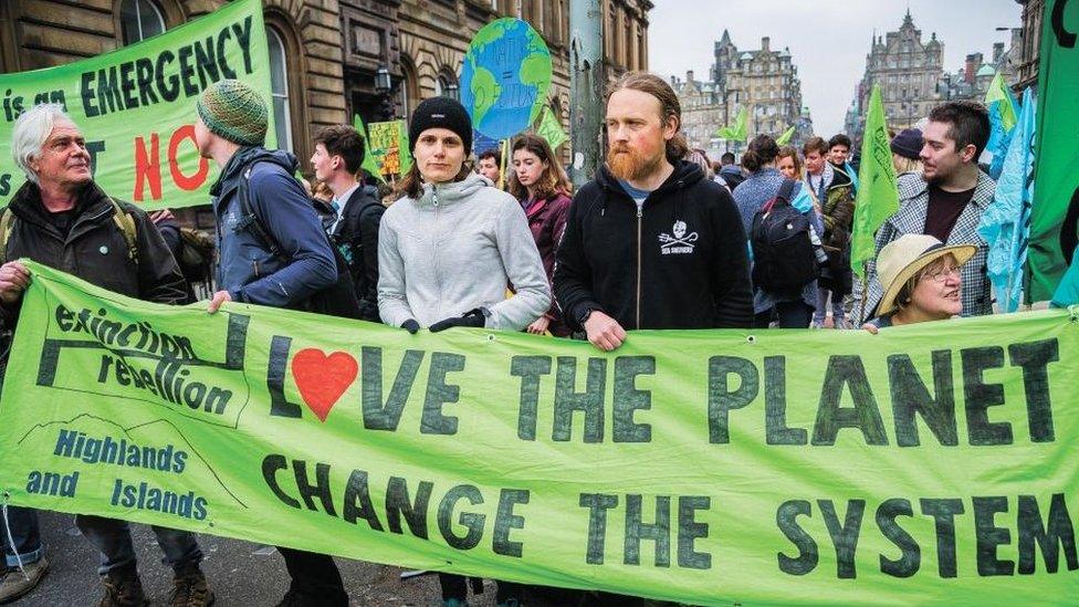 Climate change protesters, pictured here in Edinburgh in 2019, are planning high-impact disruption during COP26