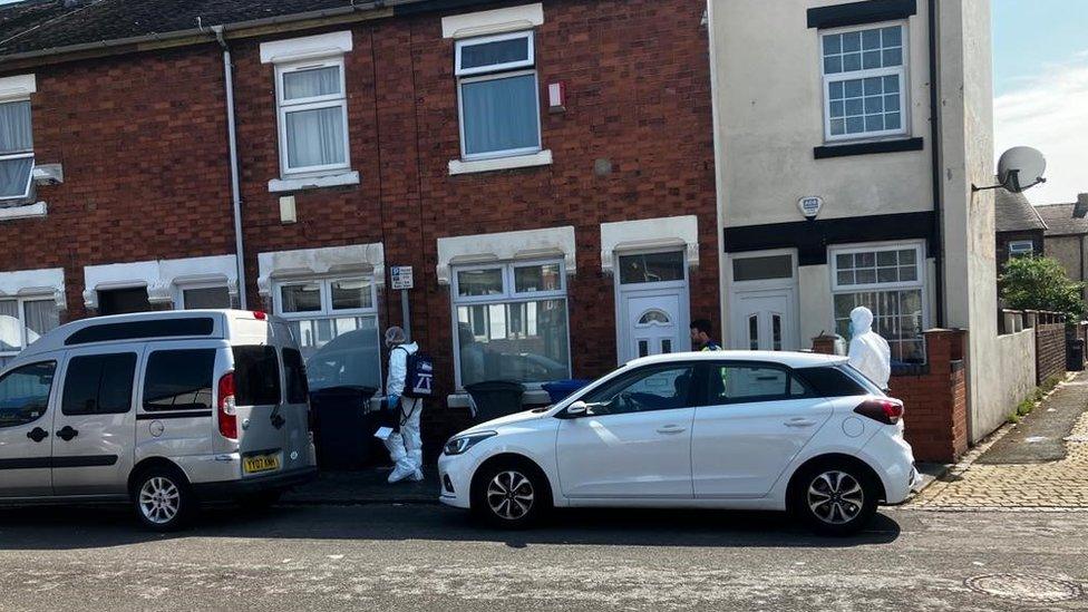 Forensic officers at the scene on Flax Street