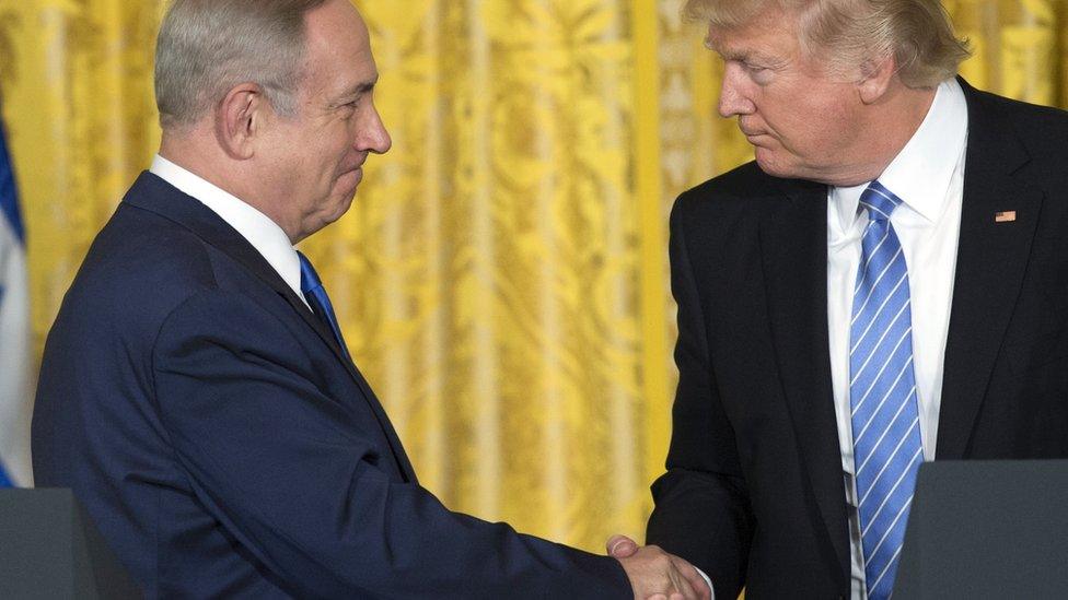 Israeli Prime Minister Benjamin Netanyahu shakes hands with US President Donald Trump at the White House on 15 February 2017