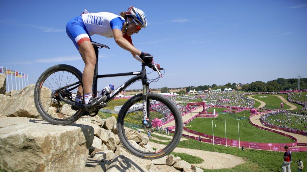 Mountain Biking: 2012 Summer Olympics: France Julie Bresset in action during Women's Cross-Country Final at Hadleigh Farm in Essex County. Bresset wins gold. Castle Point, United Kingdom 8/11/2012