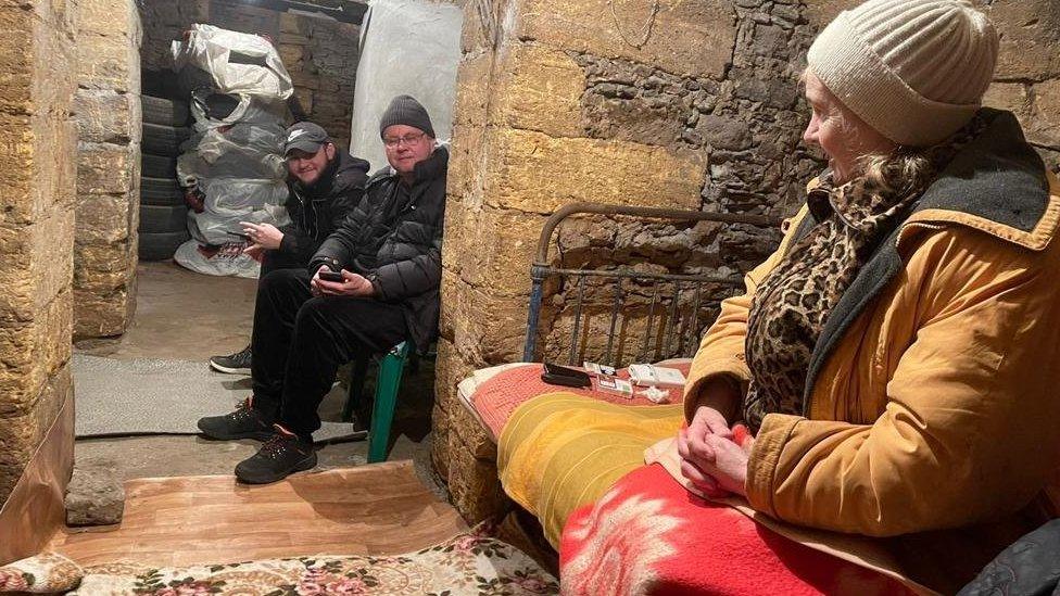 Family sheltering from Russian bombing