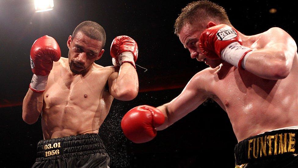 Curtis Woodhouse (left) competing in the ring