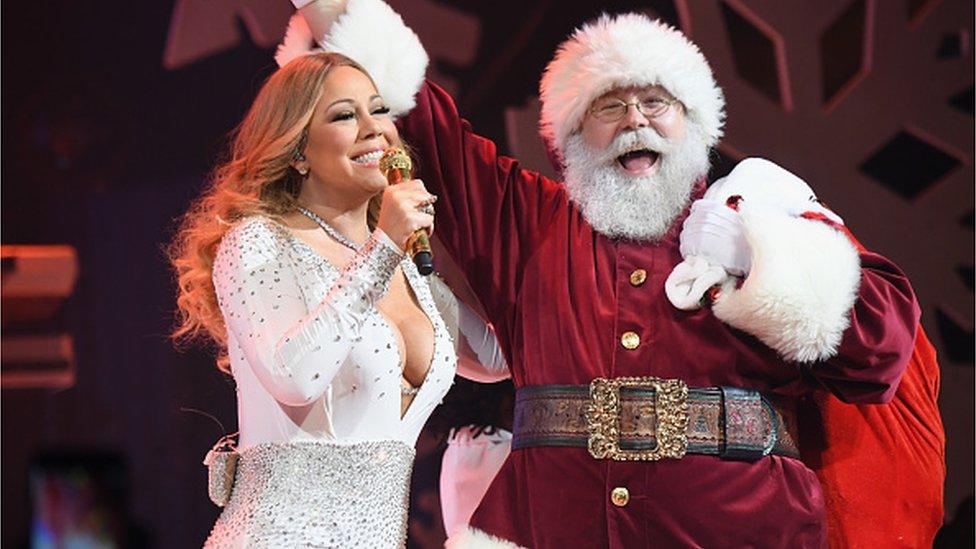 Maria Carey and Father Christmas