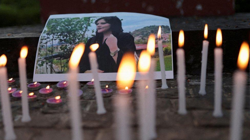 A photo of Mahsa Amini is pictured at a meeting organised by students and activists from Delhi University in New Delhi, India