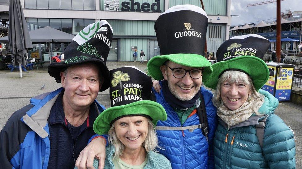 People wearing Irish hats at the start of the St Patrick's Day parade in Bristol