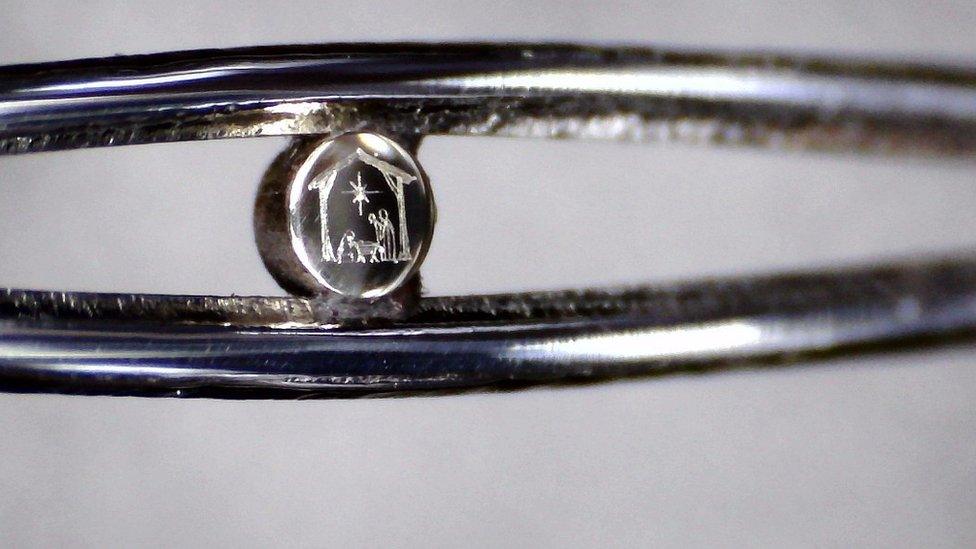 Nativity scene in the eye of a needle