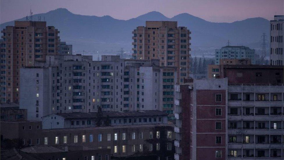 A general view shows apartment buildings and the city skyline of Pyongyang on September 22, 2017.