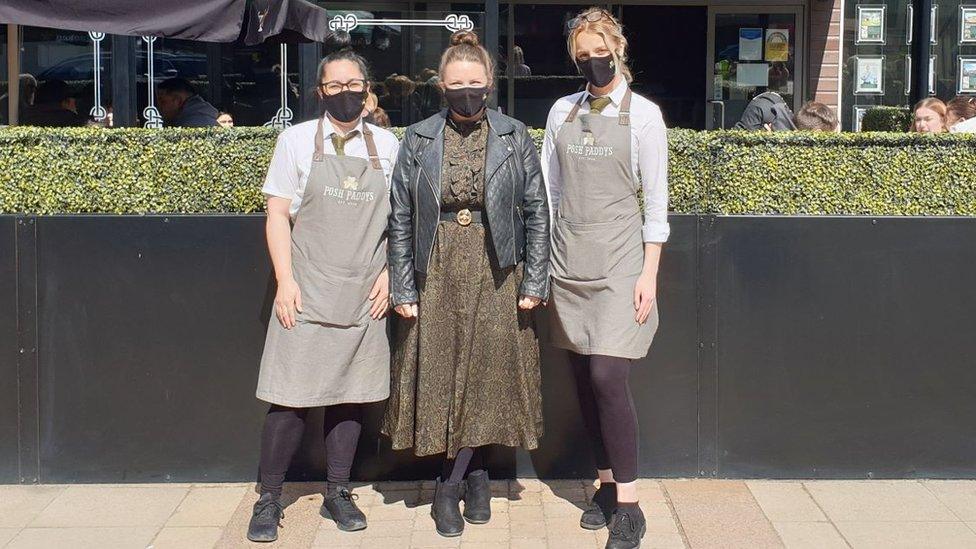 Marie O'Connor (centre) and her staff at Posh Paddy's Irish bar