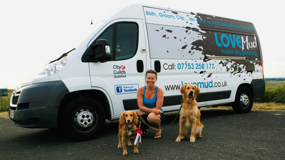 Caroline Donoghue with her dogs outside her grooming van