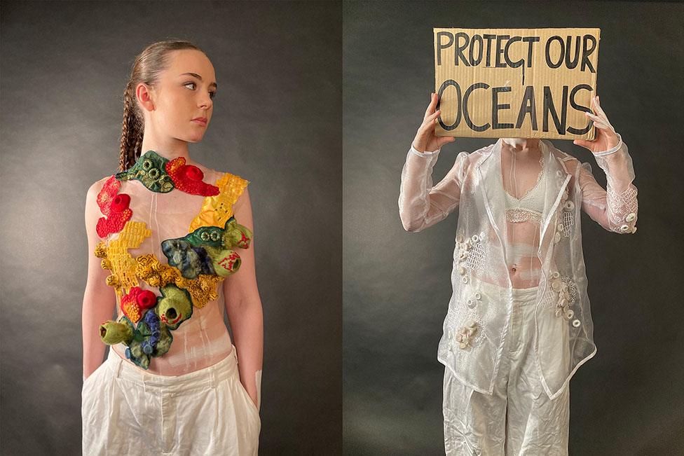 Two girls, one is wearing a bright knitted garment and the other is in white holding a sign that reads 'protect our oceans'