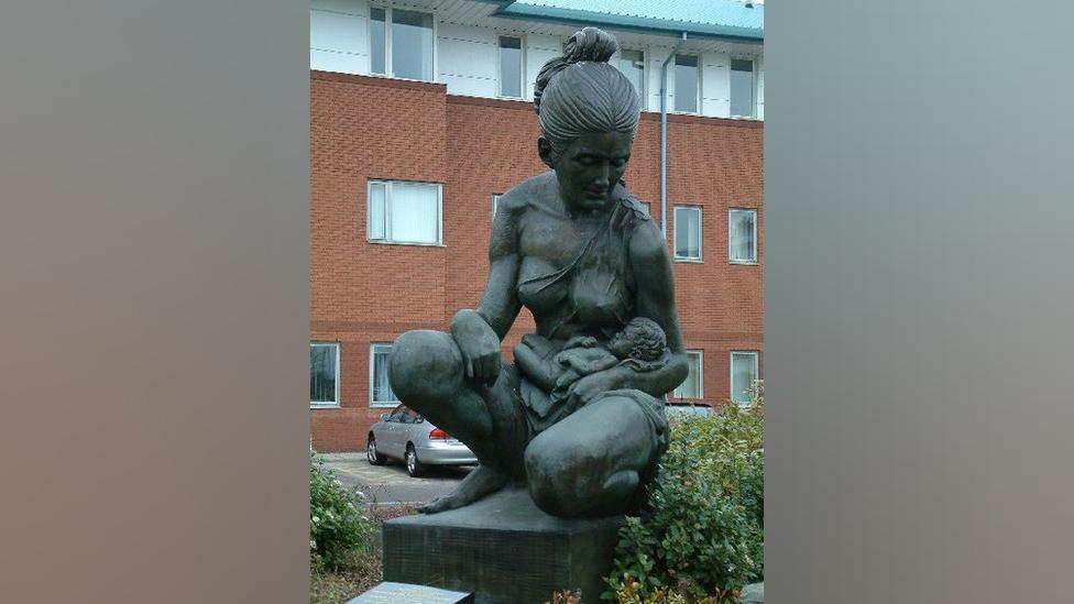 A statue of a mother and baby outside Liverpool Women's Hospital