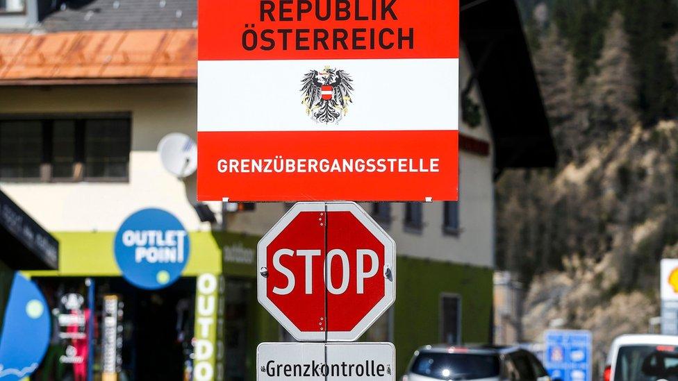 A border sign reading "Republic of Austria - border control" is seen in the Italian village of Brenner, Italy, at the Italian-Austrian border April 12, 2016.