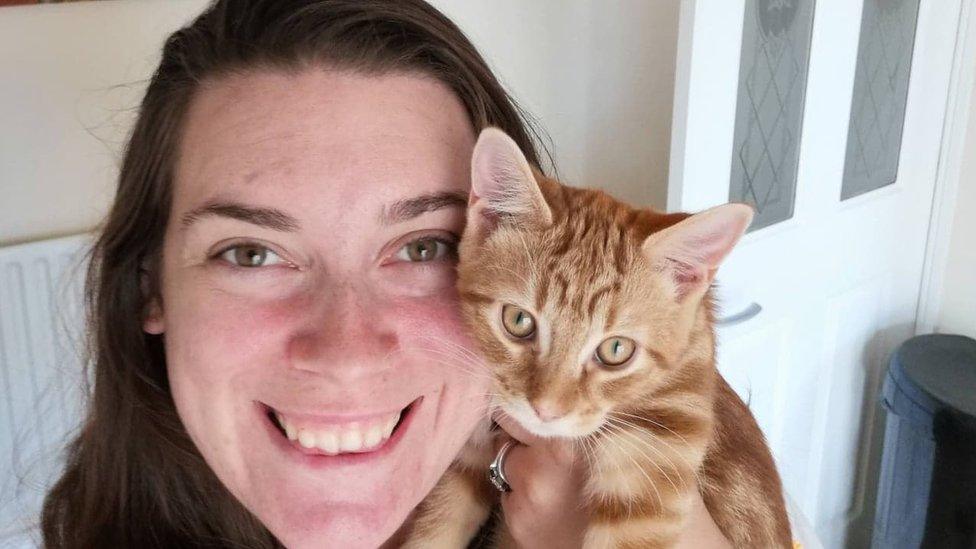 Amy Curtis and her cat Tui