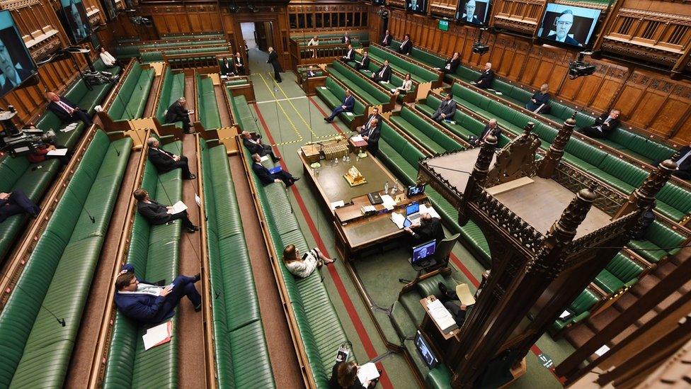 A sparse-looking House of Commons chamber