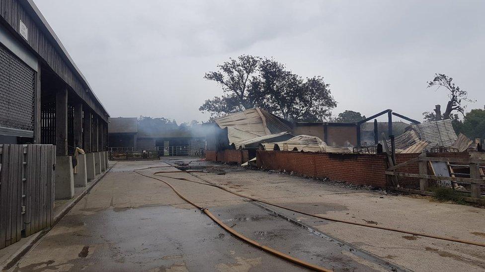 The burnt out shell of the hay barn at Bhaktivedanta Manor