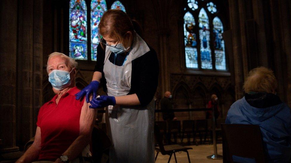 Geoffrey Beedle, 86, receives an injection of the Oxford/AstraZeneca coronavirus vaccine at Lichfield Cathedral