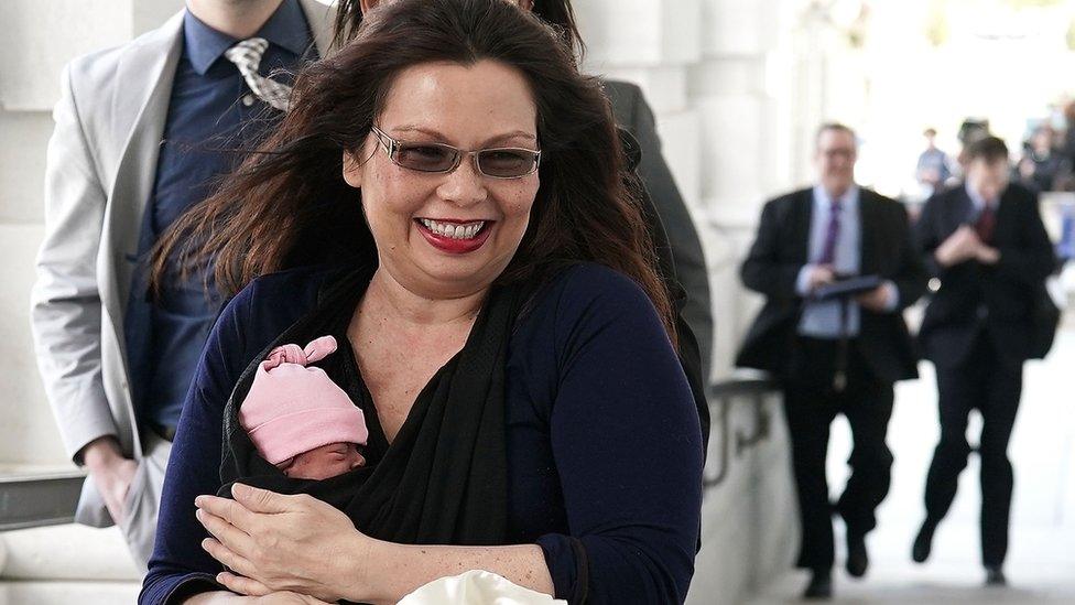 Democratic Senator from Illinois Tammy Duckworth carries her 10-day old daughter Maile Pearl Bowlsbey onto the Senate floor