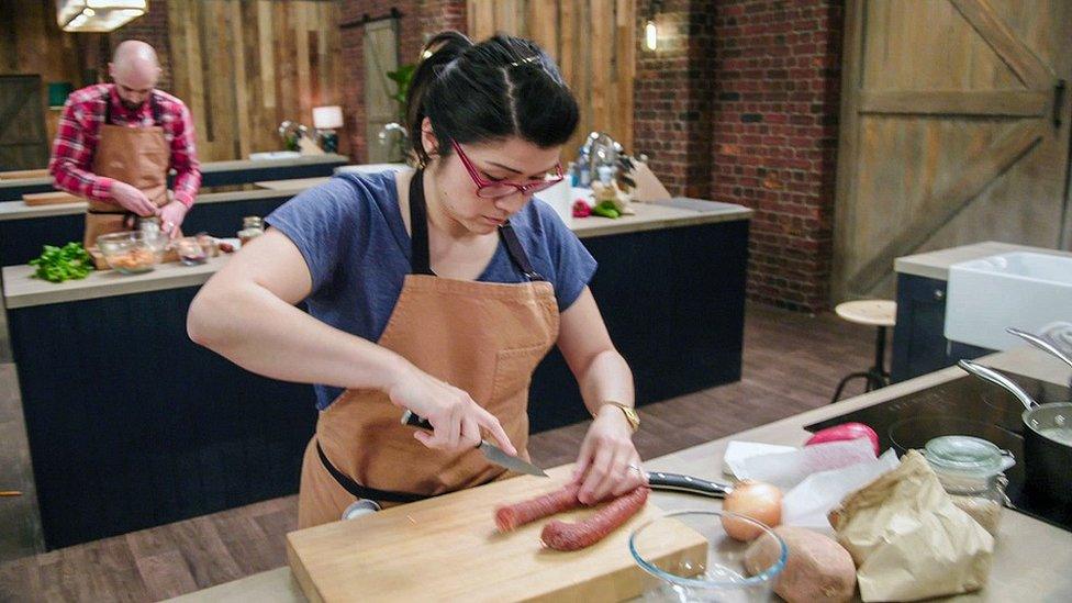 Suzie Arbuthnot chopping vegetables.