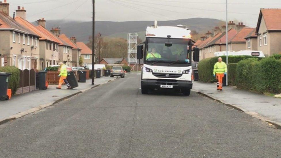 Refuse collectors from Denbighshire council take in the latest batch of non-recyclable waste