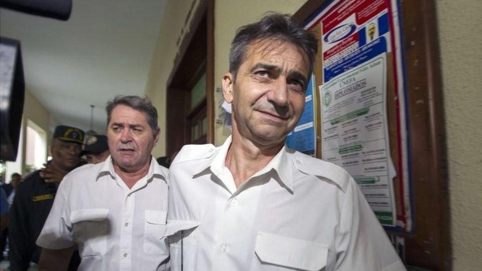 Pascal Fauret (left) and Bruno Odos leave the Court House in Santo Domingo after a hearing on May 8, 2014.