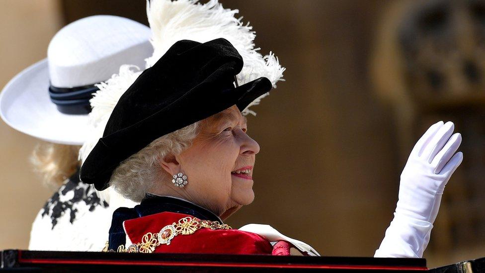 Queen Elizabeth waves to crowds