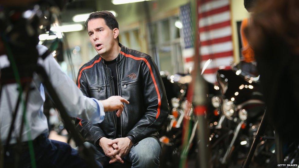 Wisconsin Governor Scott Walker sits for an interview before participating in a Roast and Ride event hosted by freshman Senator Joni Ernst (R-IA) on June 6, 2015 near Des Moines, Iowa