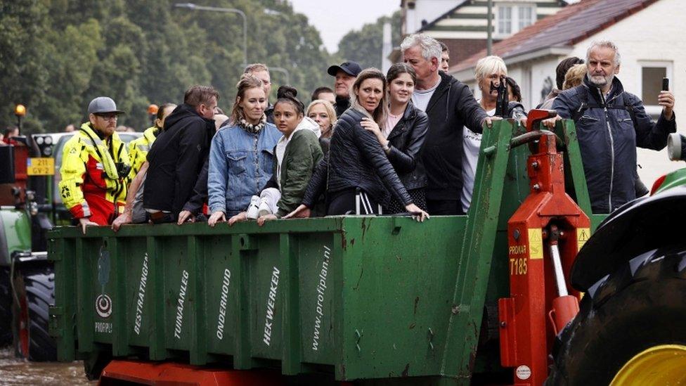 The fire brigade evacuate people from their homes in South Limburg, the Netherlands, 15 July