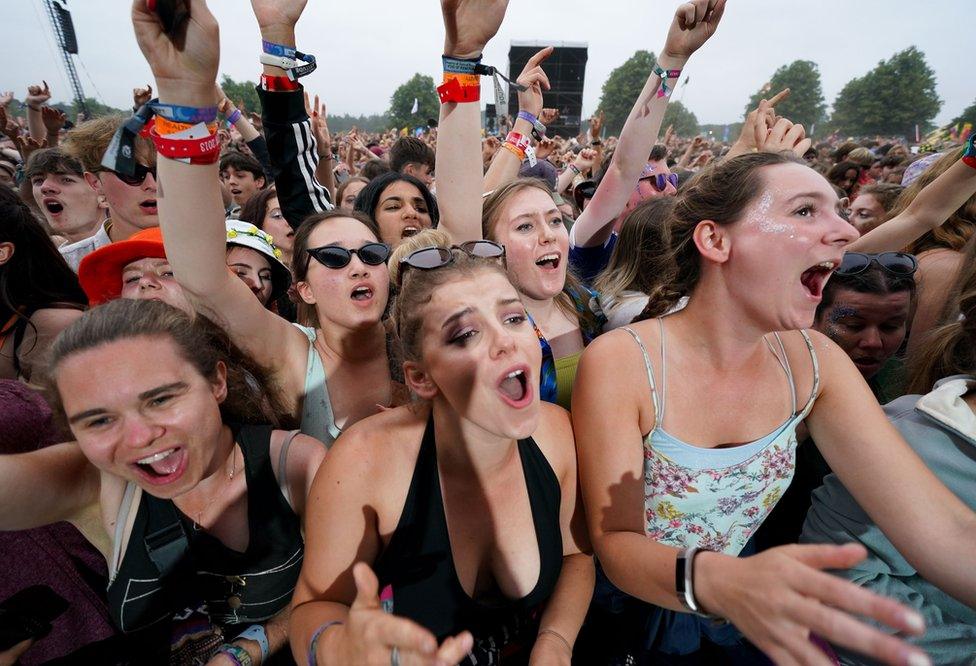 Festival goers at Latitude festival in Henham Park, Southwold, Suffolk