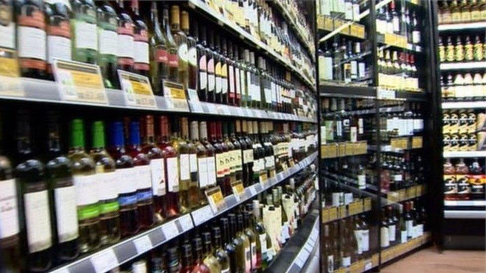 Bottles of alcohol on shop shelves