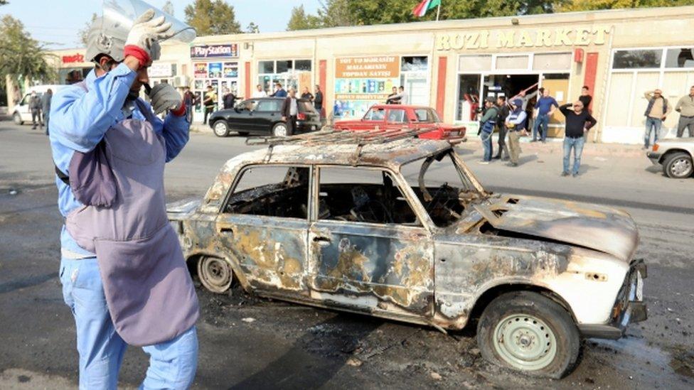 Shells reportedly hit a street during a military conflict over the breakaway region of Nagorno-Karabakh, in the town of Barda, Azerbaijan, 28 October 2020