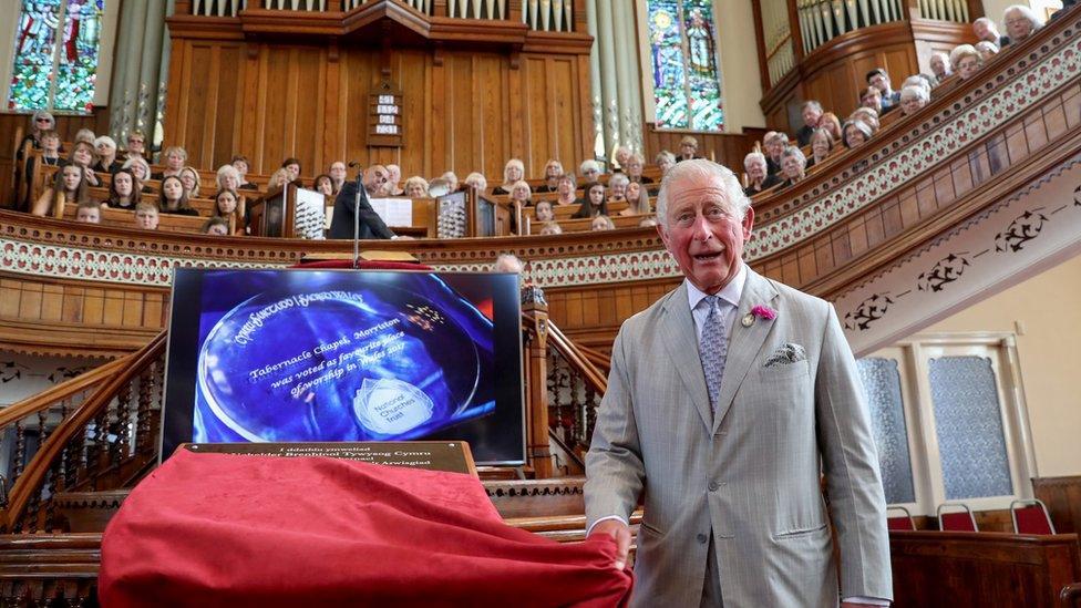 Prince Charles unveils a plaque in Swansea