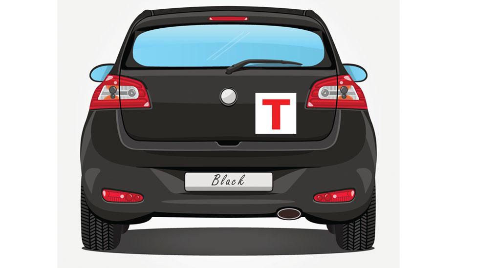 A car with a T plate for tourists