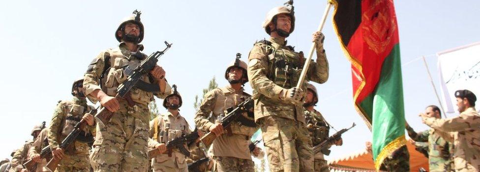 Afghan security forces pictured during a military march