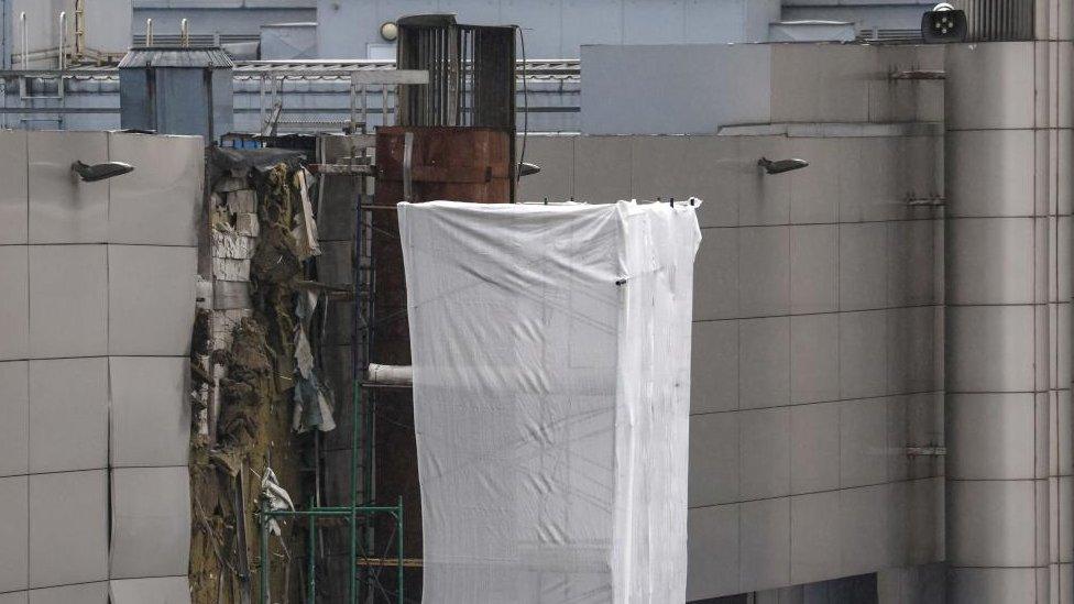 A damaged part of the Expocentre exhibition centre building after a drone reportedly fell in Moscow, Russia, 18 August 2023