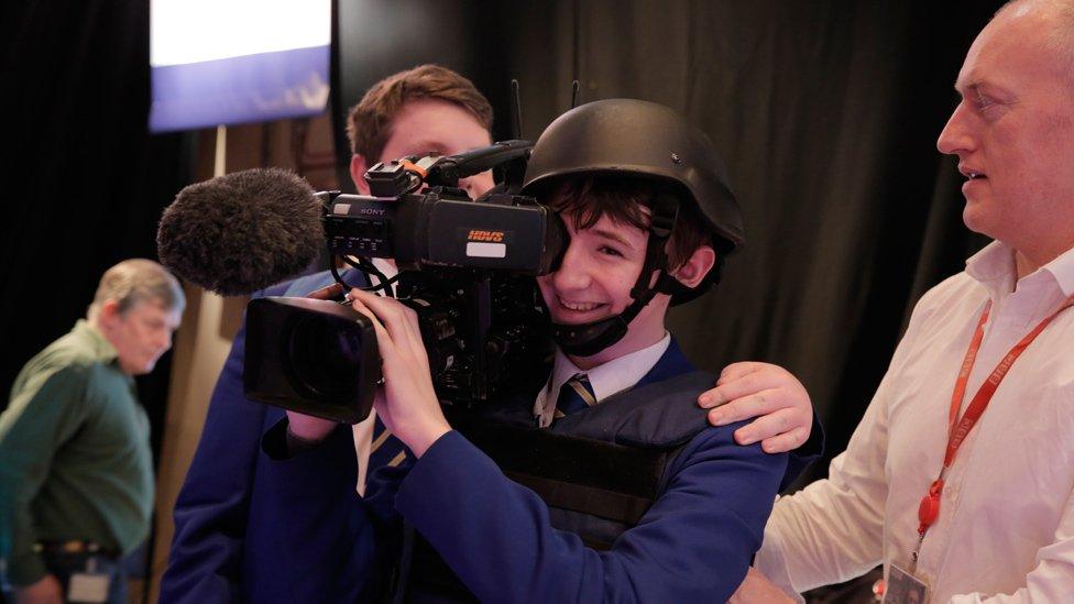 A student gets to grips with filming under the tutelage of former Ireland Correspondent Andy Martin