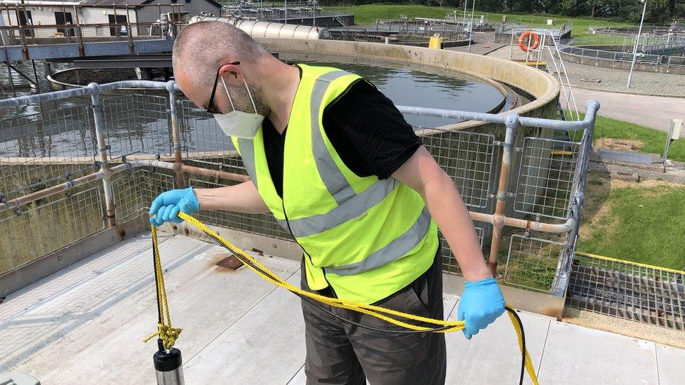 Man at sewage plant