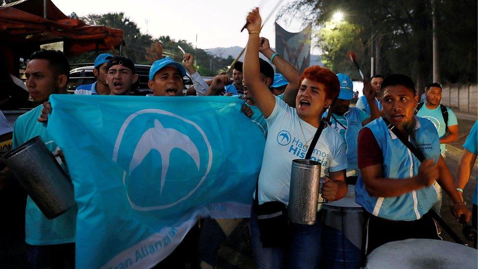 Great National Alliance (GANA) supporters cheer after the presidential election in San Salvador, El Salvador, February 3, 2019