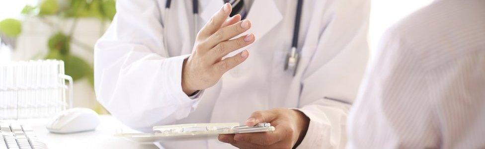 doctor talking to a patient